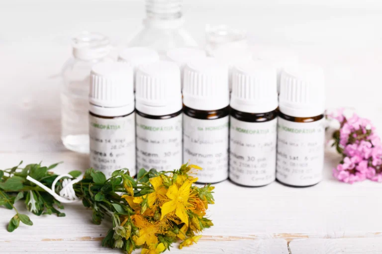 homeopathy homeopathy concept with homeopathic medicine dried healing herbs bottles homeopathic globules 511010 330 1 768x511